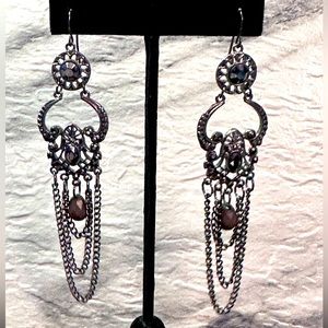 Chain and rhinestone dangle earrings.